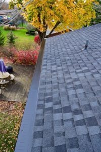 Dennison Exterior Solutions & Gutter Topper with CertainTeed's LandMark Pro Moire Black Shingles