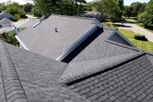 Intersecting Roof Lines byDennison Exterior Solutions & Gutter Topper
