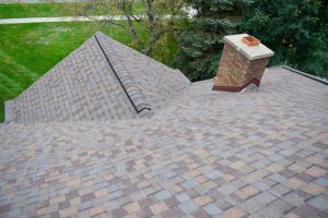 Dennison Exterior Solutions & Gutter Topper - Cricket/Saddle behind the Chimney 