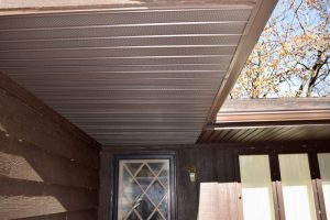 Dennison Exterior Solutions & Gutter Topper with Royal Brown Aluminum Vented Soffit