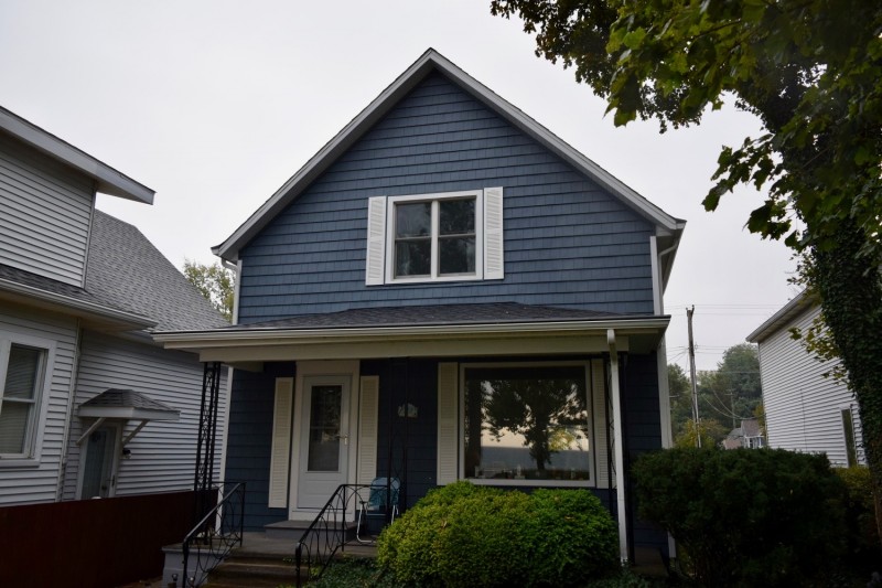 Pacific Blue Vinyl siding by CertainTeed. We like BOLD white trim