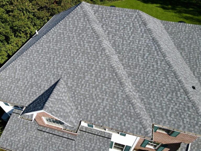 Dennison Exterior Solutions roofing team and completed roofing work