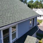 Aerial view of the roof, new seamless gutter and Solution gutter guard on a South Bend, IN home