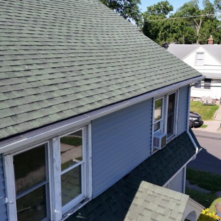 Aerial view of the roof, new seamless gutter and Solution gutter guard on a South Bend, IN home