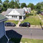 Aerial view of new vinyl siding and gutter guards on a South Bend, IN home