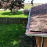 Corner of new seamless gutter with Solution gutter guard in Berrien Springs, MI