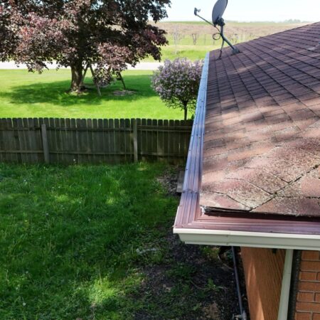 Corner of new seamless gutter with Solution gutter guard in Berrien Springs, MI