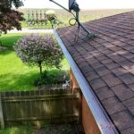 Solution gutter guard along the roof edge of a Berrien Springs, MI home