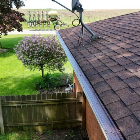 Solution gutter guard along the roof edge of a Berrien Springs, MI home