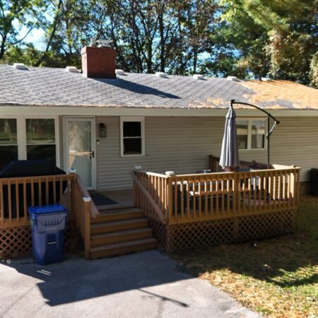 Rear of a Benton Harbor, MI home with new seamless gutters and Needle Guard