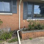 Downspout connected to a new underground drain at a Berrien Springs, MI home