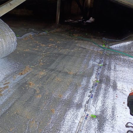 Heat Deflector Insulation laid over attic insulation in Berrien Springs, MI