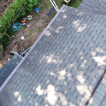 Aerial view of the back roof and new seamless gutters on a South Bend, IN home
