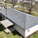 Finished CertainTeed NorthGate Georgetown Gray roof replacement on a Baroda, MI ranch home with Charcoal Gutter Topper