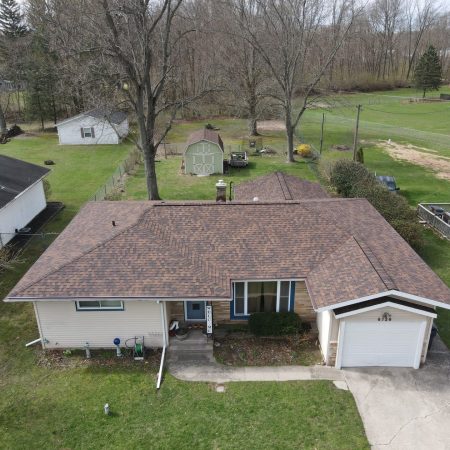Aerial view of a Coloma, MI home with a new CertainTeed NorthGate Burnt Sienna roof