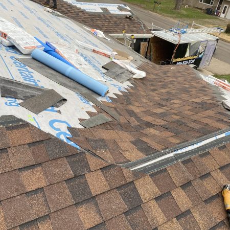 NorthGate Burnt Sienna shingles going on over CertainTeed underlayment in Coloma, MI