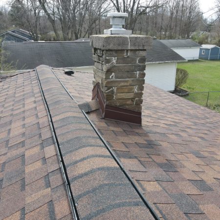 New ridge vent and chimney with new flashing on a Coloma, MI roof