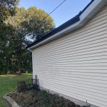 Hobart IN Gutters 01 Hobart, IN home with new seamless black gutters, white downspouts, and white aluminum fascia