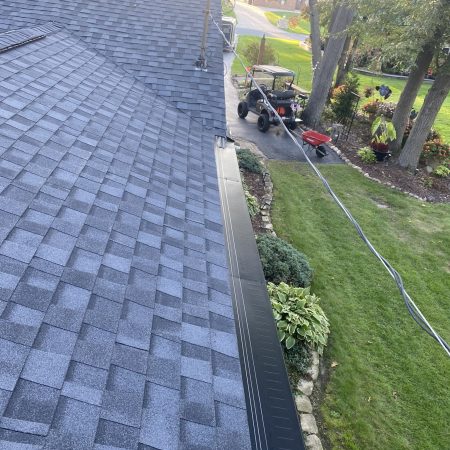 Black Gutter Topper on new seamless gutters along the front of a Hobart, IN home