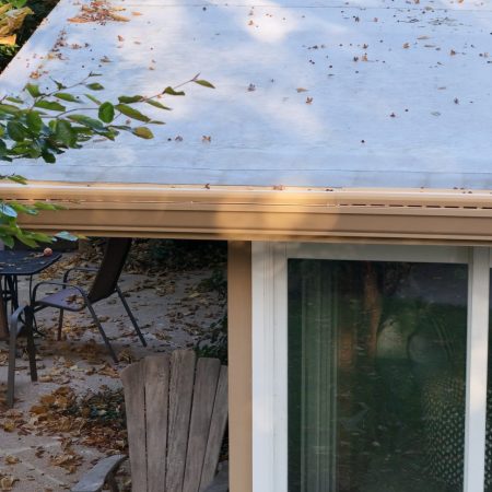 Heated Gutter Topper on Buckskin gutters over a patio in St. Joseph, MI