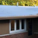 St Joseph MI Heated Gutter Topper 10 Buckskin seamless gutters with Tan Gutter Topper on a St. Joseph, MI home