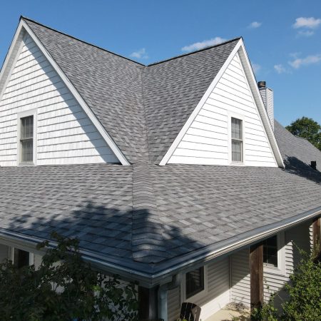 Finished CertainTeed NorthGate Pewter roof replacement on a St. Joseph, MI home with twin gables and Leaf Terminator gutter protection