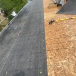 St. Joseph MI Roof Leaf Terminator 09 WinterGuard ice and water shield at the eave over new decking, with RoofRunner going on the balance of the deck