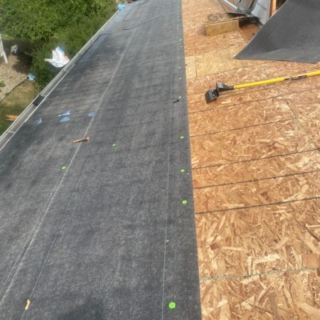 WinterGuard ice and water shield at the eave over new decking, with RoofRunner going on the balance of the deck
