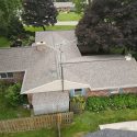 Roof replacement with CertainTeed NorthGate Weathered Wood shingles in Stevensville, MI