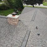Chimney flashing, ridge vent and hip caps on roof replacement in Stevensville, MI