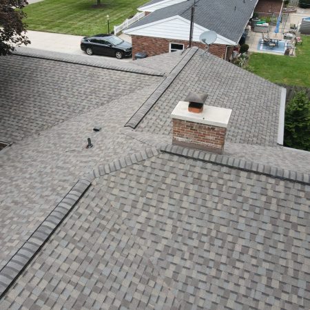 Chimney saddle and flashing on new NorthGate roof in Stevensville, MI